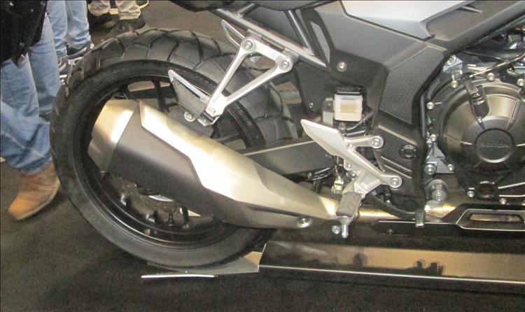 The new exhaust is matt black with polish metal cover and ends and all angular