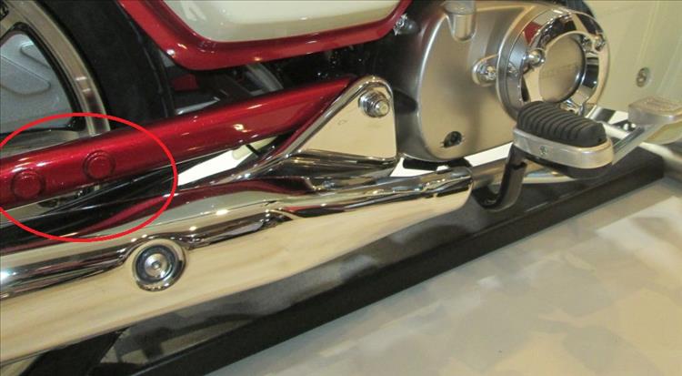 Along the swingarm are to covered holes, presumably for rear footrests