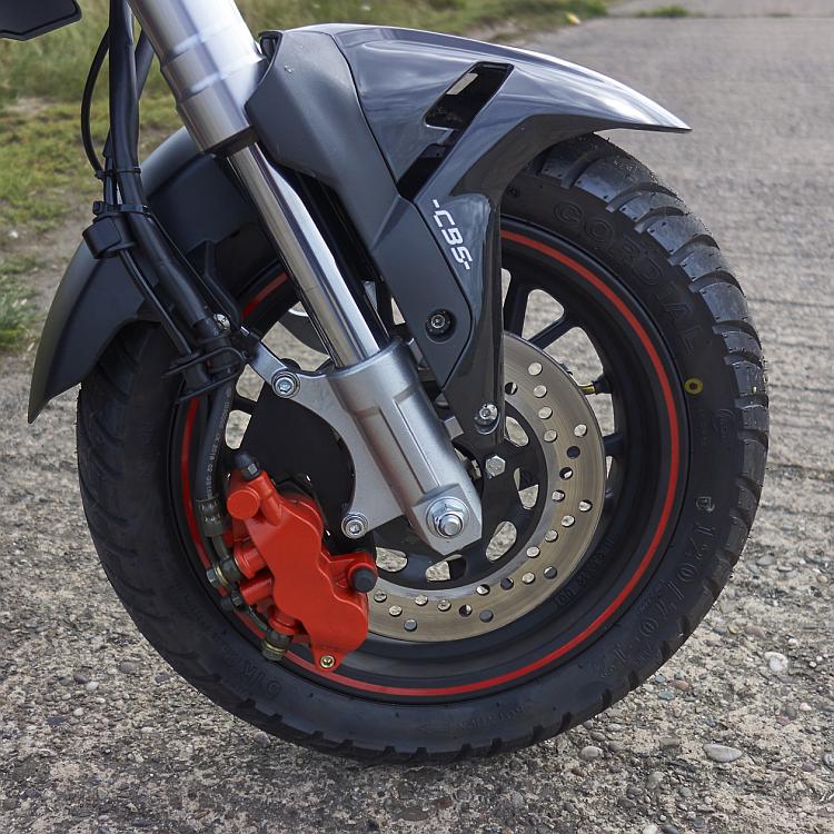 The front brake is painted red and the forks are upside down