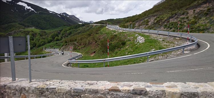 A switchback on a road through the Picos de Europa with beautiful scenery