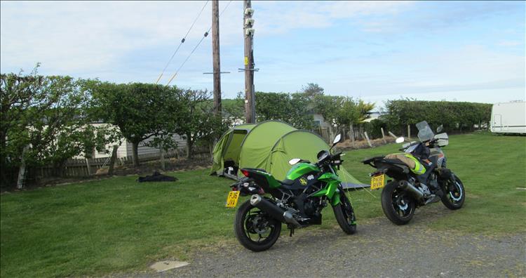 The Z250SL and CB500X by the tent ready for the night in Ayrshire
