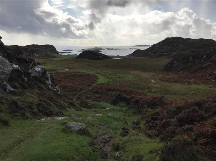 Green slopes, rocky outcrops, harsh moorland and remote views on the isle of Iona