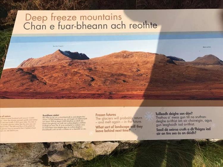 A roadside information board explaining the deep freeze mountains of Achiltibuie
