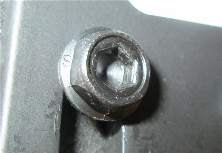 A typical hex bolt with an allen socket in the head as well