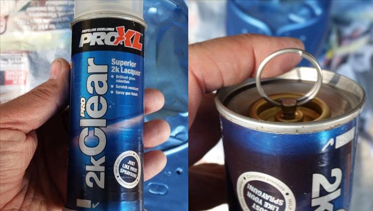 A can of 2k lacquer and the twist ring to mix the lacquer and hardener