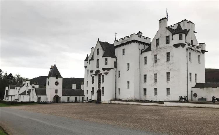 A white painted many storey'd castle. More like a stately home than a fortification