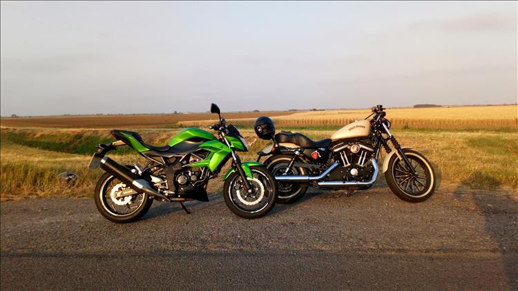 Z250SL and a HArley Davidson in front of a vast flat field in Lincolnshire