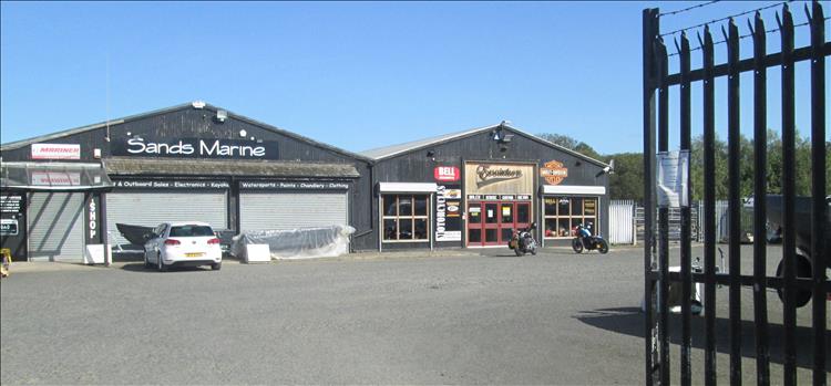 A small motorcycle shop on the marina