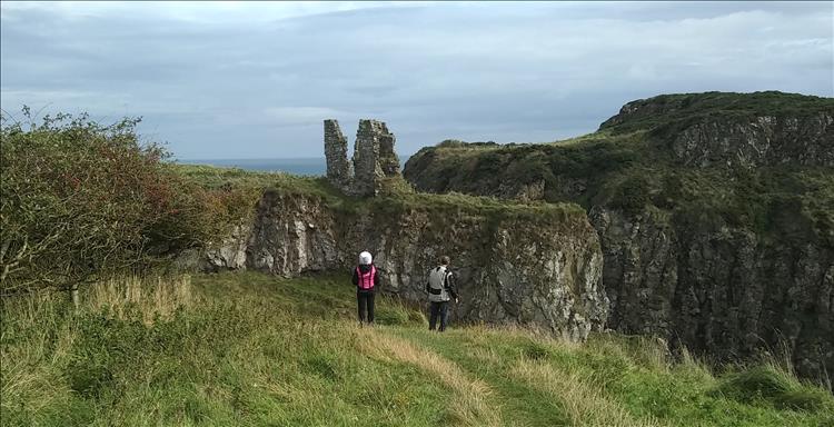 3 stone walls just out of the cliffs, the remnants of Dunseverick Castle