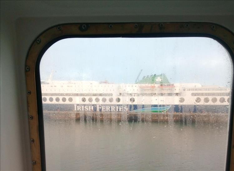 Seen through a wet window of Mick's ferry there's another ferry ready to leave port