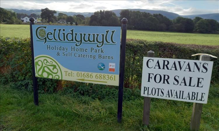 The sign for the caravan site where Bogger has broken down