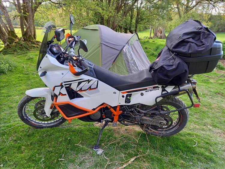 Big KTM 990 with a tent behind it