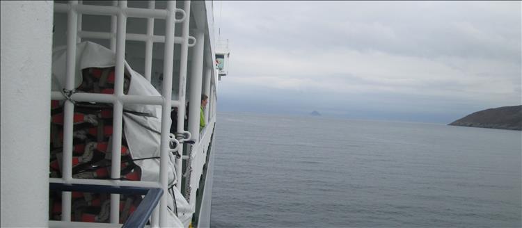 Looking out over a grey sea from a ferry