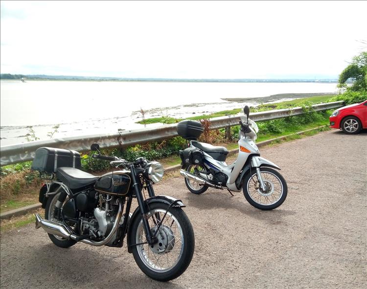 An old Velocette and Mick's Innova with the river severn in the background