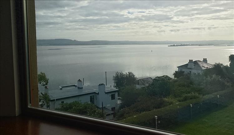 Looking our from the window we see the waters and surrounding hills of Loch Ryan