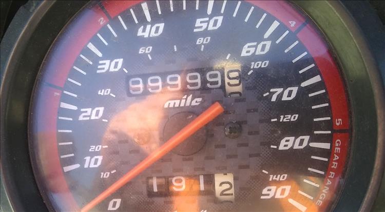 The odometer on Ren's CBF125 reads 99,999.9 miles