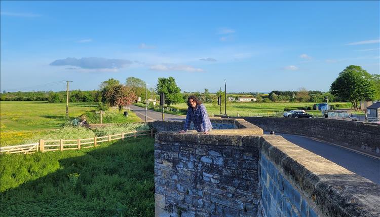 Ren stands on the old stone bridge at Bidford 