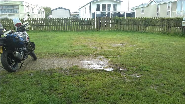 The grass is wet, there's puddles and it's rather damp at the campsite this morning