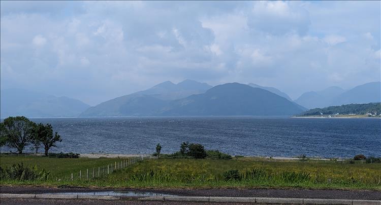 The mountains in the distance look hazy, romantic and beautiful at Loch Linnhe