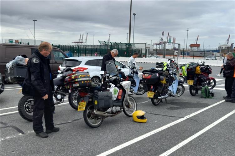 The chaps and their various 125s with camping luggage in the queue at the ferry terminal