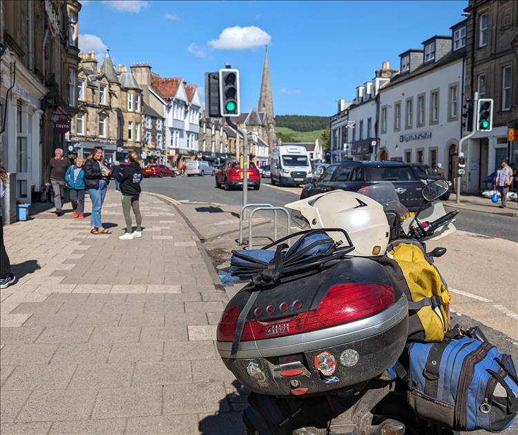 A mixture of architecture along the road at Peebles as the sun shines