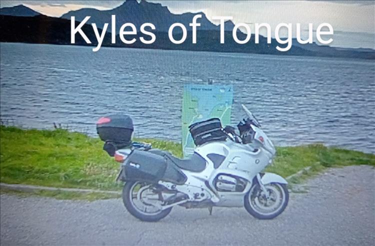 ROD BMW touring motorcycle beside the waters and angular hills on the Kyle of Tongue