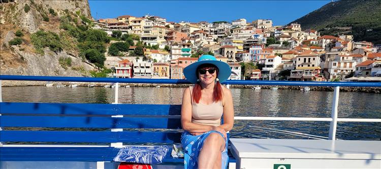 Sharon smiles happily while on holiday in Greece