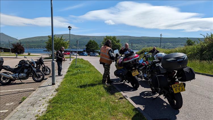 Bikes and rider in the sunshine and lochside views at Inverery Coop