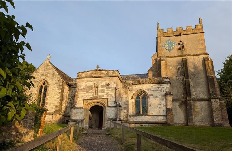 The church is a mixture of the old stone and some render at Ashbury