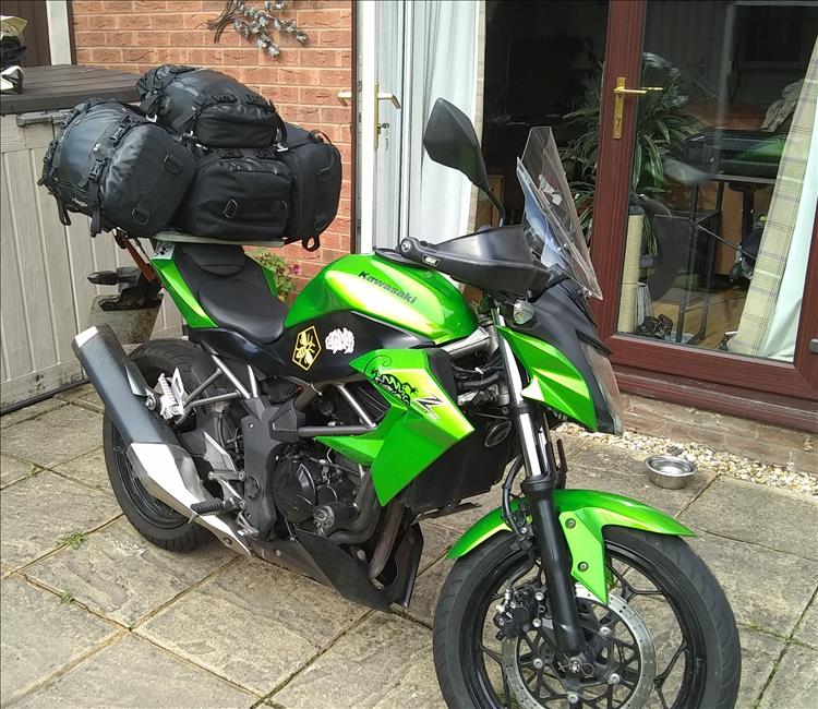 Sharon's Kawasaki full loaded with Kriega bags and ready to ride to Devon