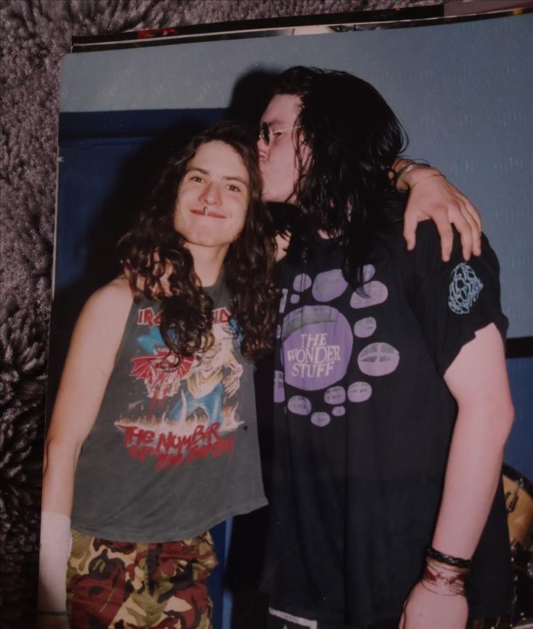 A very young Ren with long hair