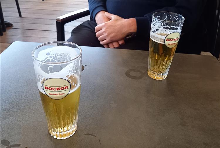 2 beers on a table, presumably in Belgium