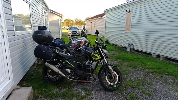 The Kwak and the Honda outside the lodge in the morning sunshine getting loaded up