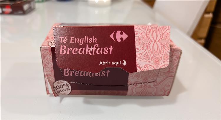 A purple box with te English Breakfast, tea bags