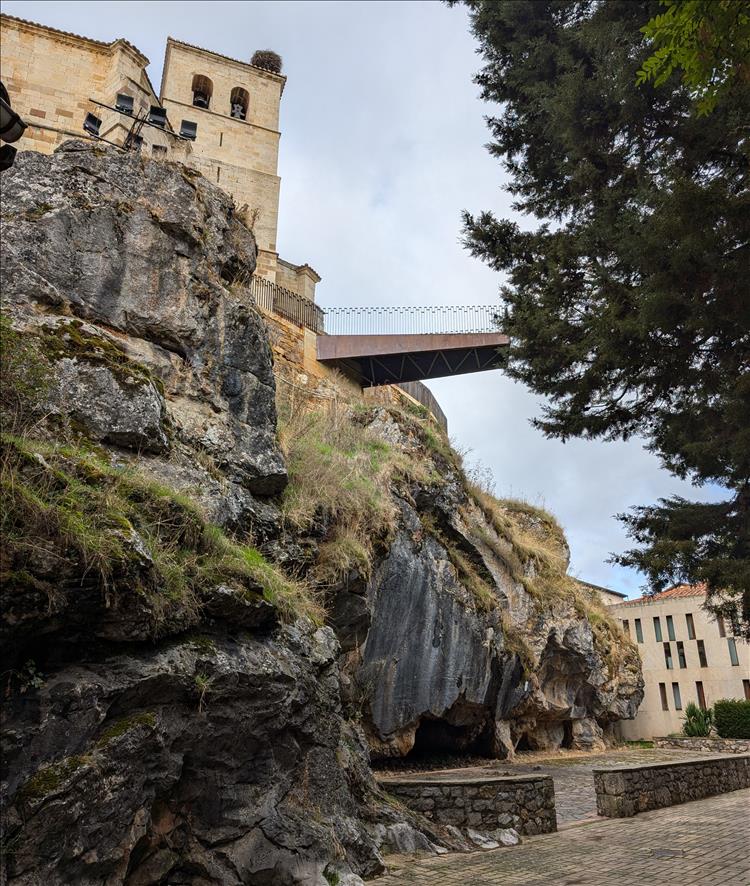 Atop a rocky outcrop we can see the church - and a metal platform justting out from the rocks