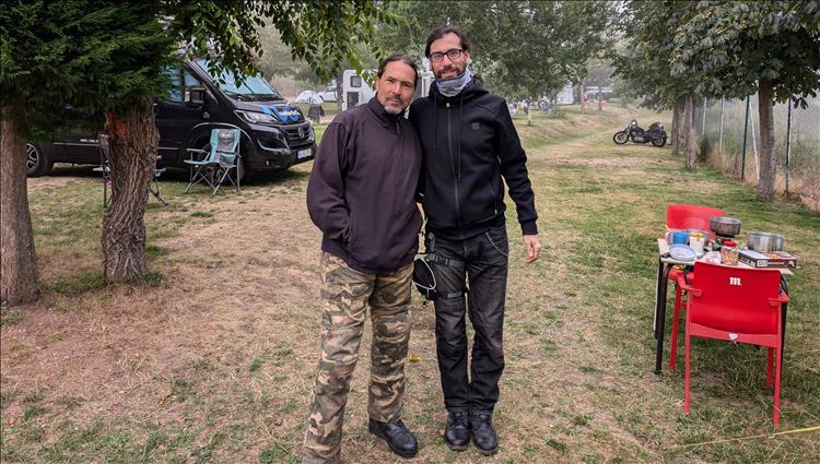 Ren and David pose for a picture on the campsite