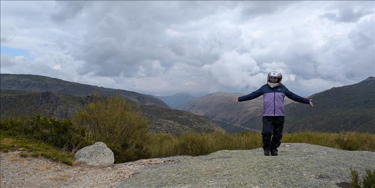 Sharon atop a mound arms open showing us the amazing views