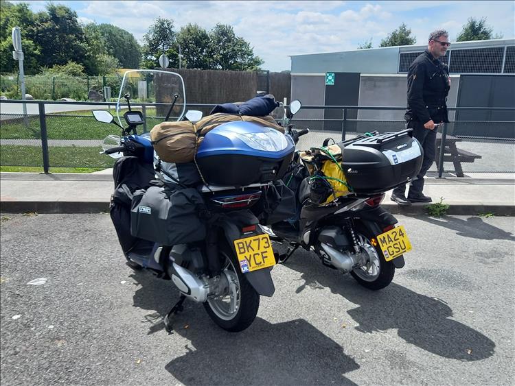 SH125i and SH125 mode again covered in camping kit and luggage