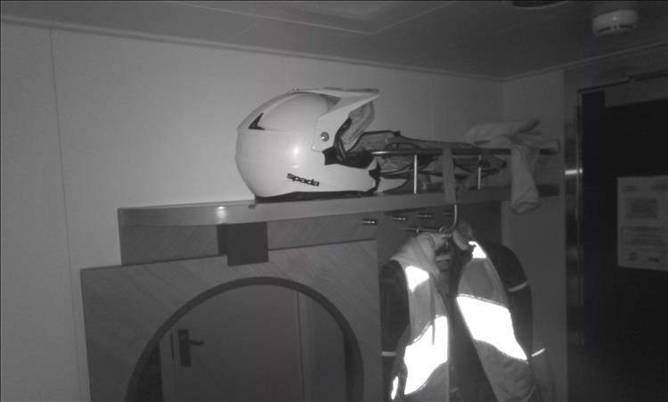 Black and white night vision pic of inside the cabin, we see Ren's helmet and Sharon's jacket