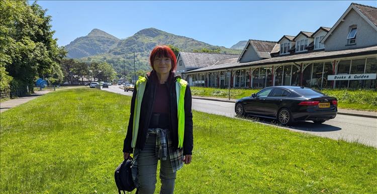 Sharon in the sun with the lovely Llanberis hills behind her as she smiles
