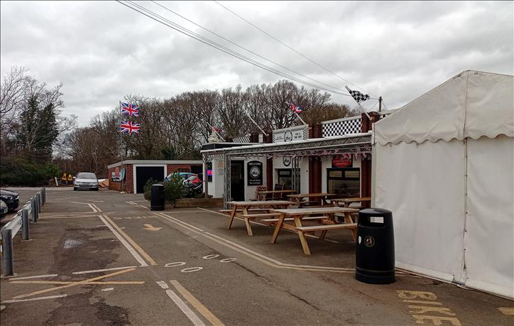 The Super Sausage cafe car park in the wind