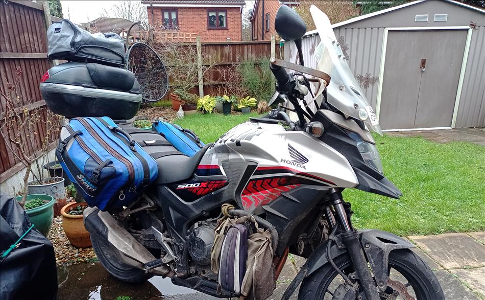 Ren's bike with saddle bag in Sharon's garden on a grey winter's day