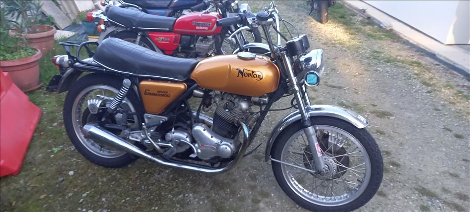 A classic Norton commando in a bronze colour