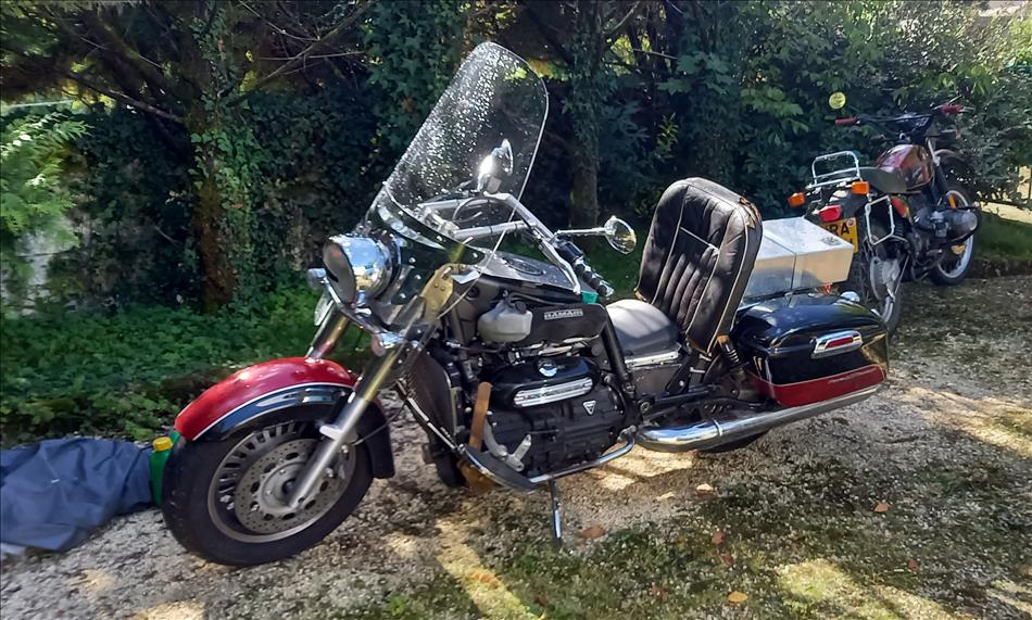 Triumph Rocket 3 modified with super low seat and feet forwards riding position