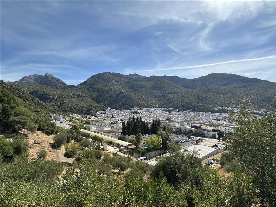 Looking down into the spanish town from one of the hilltops, the town is surrounded by peaks