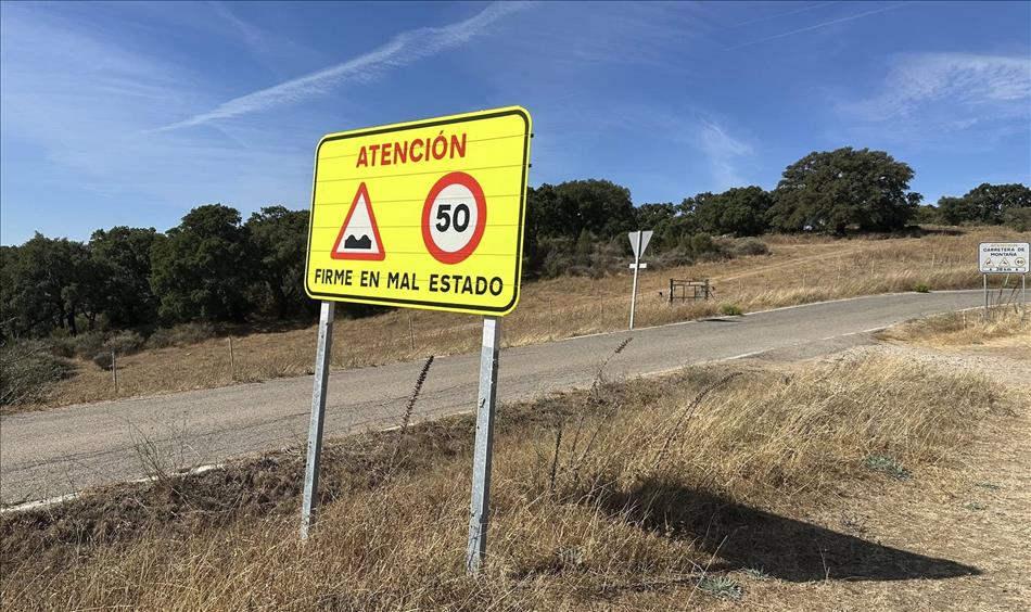 FIRME EN MAL ESTADO the sign say, bad road with a 50kph limit