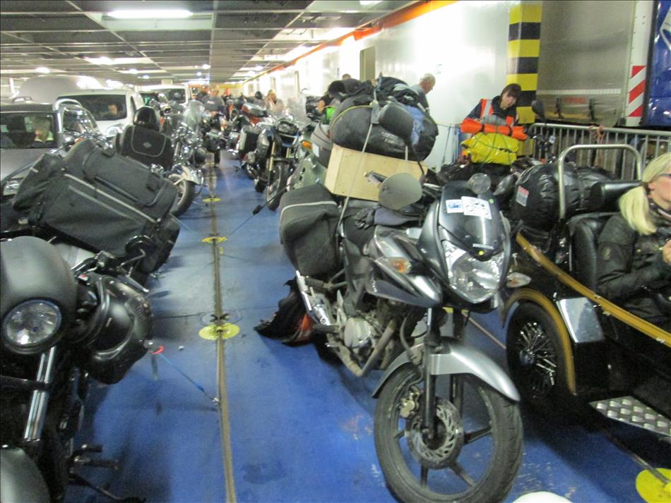 A very overloaded 125 on a ferry