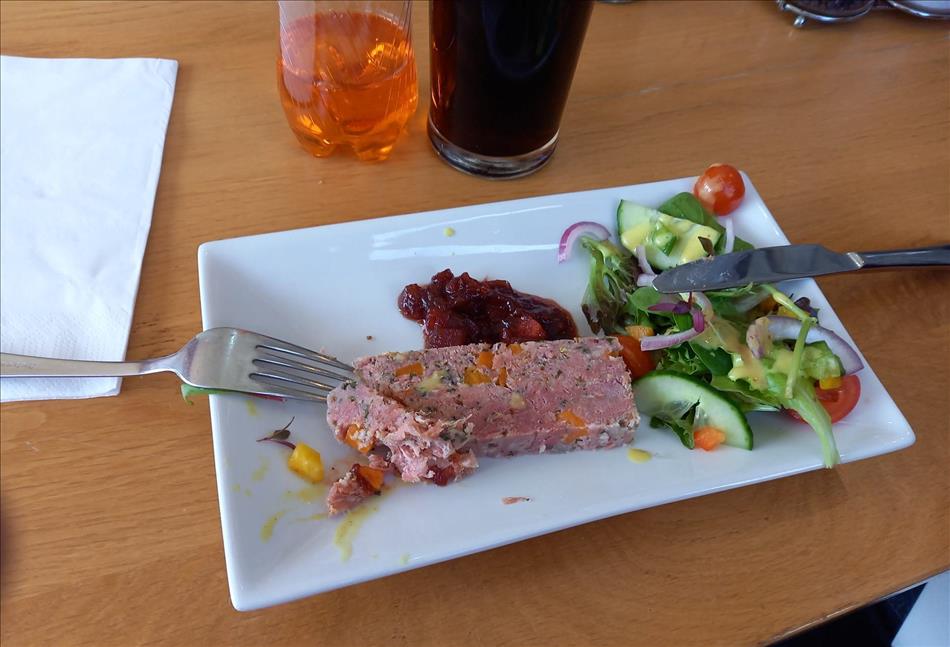 A curious block of meat and veg with a serving of veg