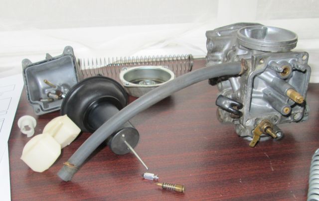 the stripped down part of the carburettor on the 250