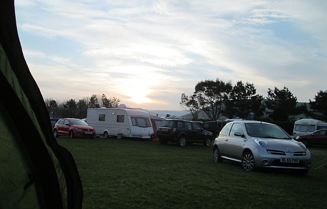 failing light over the tents and caravans at pall mall campsite tywyn